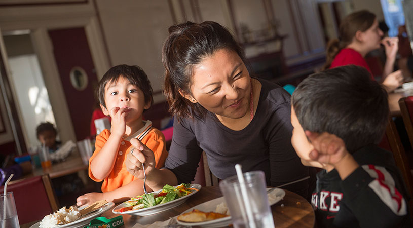 Current Single Parent Scholar student Breana Park with her son, Aiden (looking at camera).