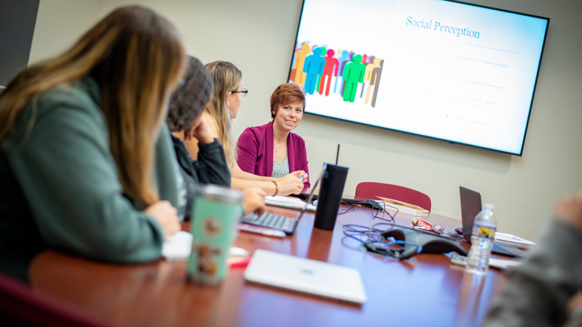 Photo of Psychology faculty instructing class