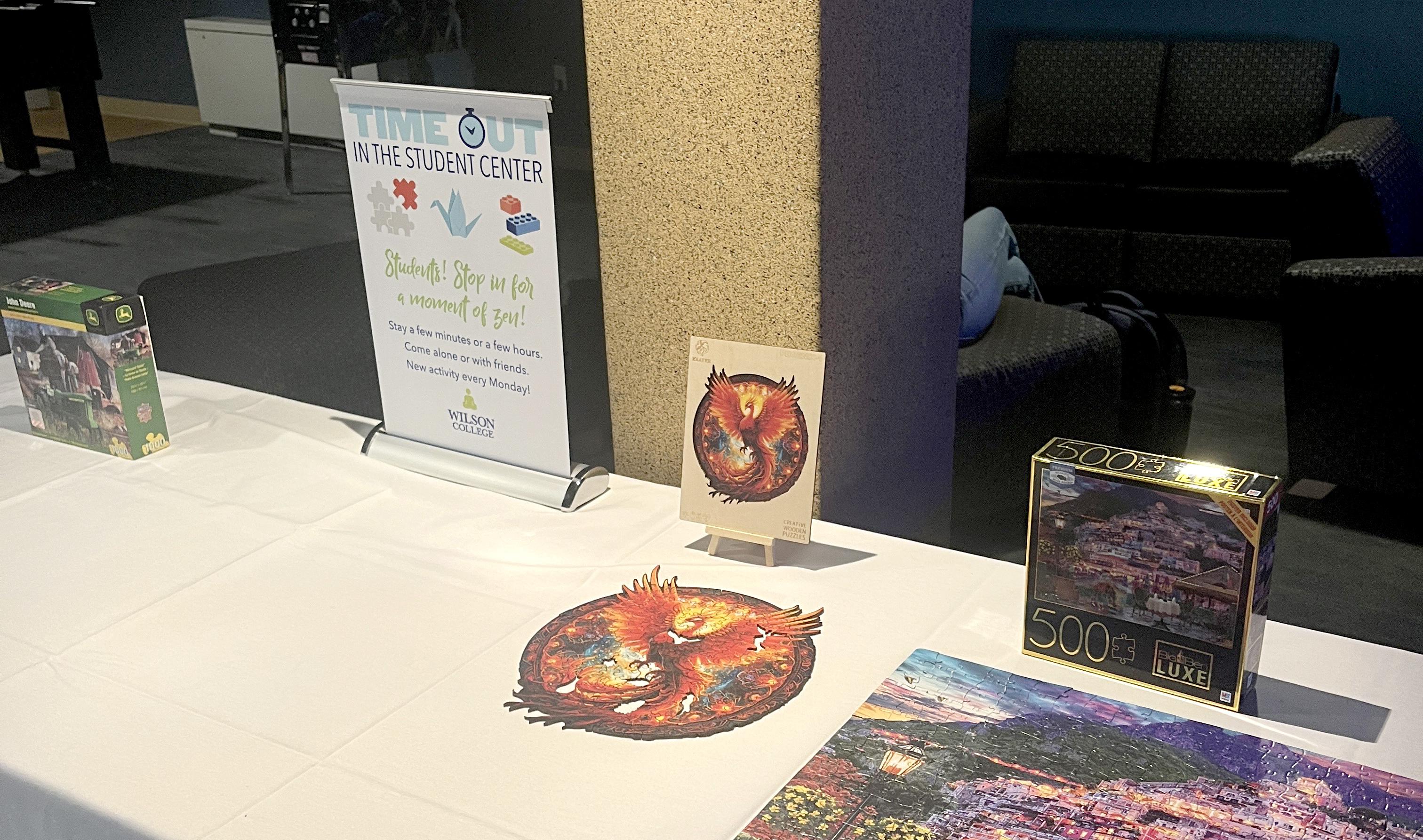 Jigsaw puzzles on a white table.