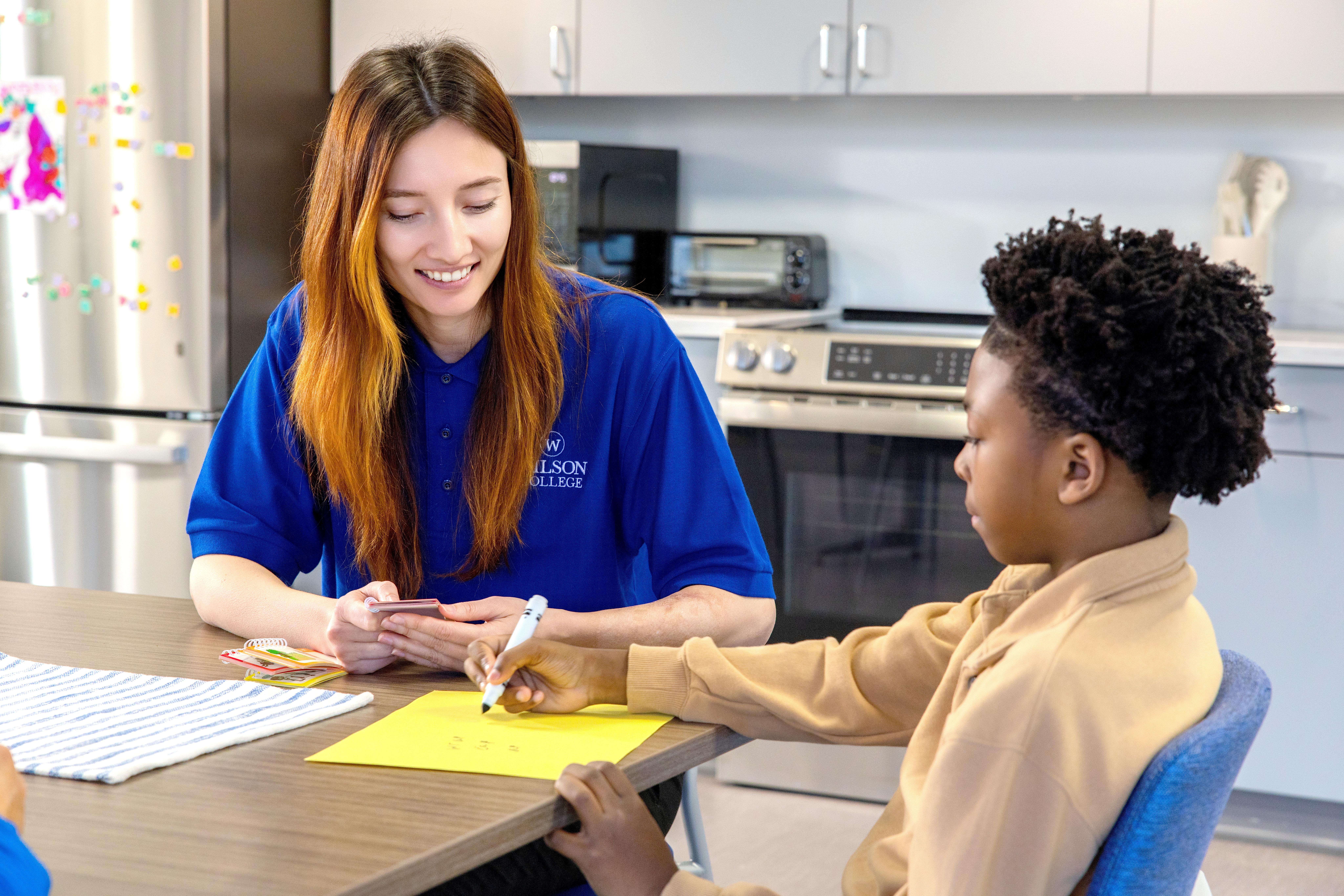 MS-SLP student with child